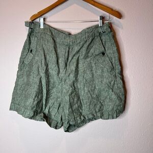 Athleta Voyager Linen Shorts in a green color, likely featuring a relaxed an adj